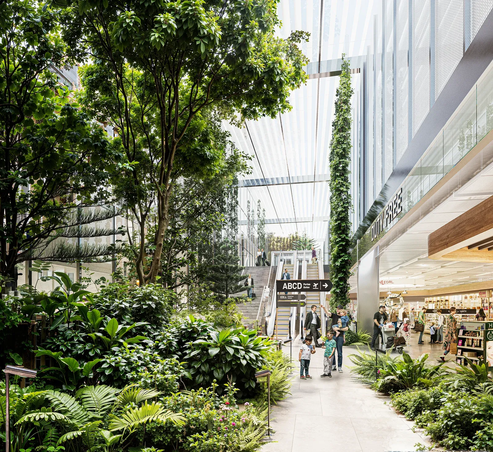 Interior acristalado del aeropuerto de Ginebra con vegetación y escaleras